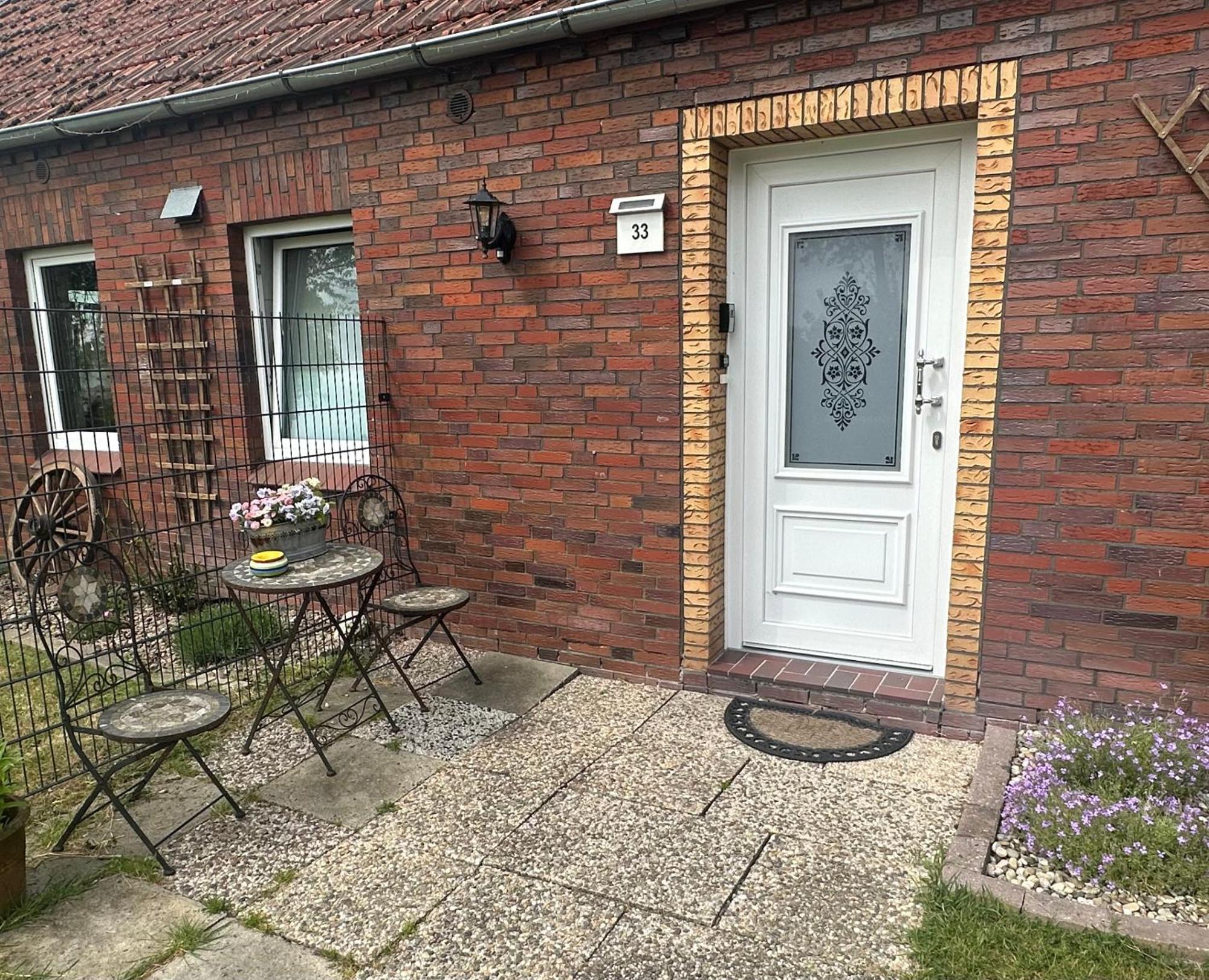 Rosenhaus Esens - Wohnung Backbord Exterior foto
